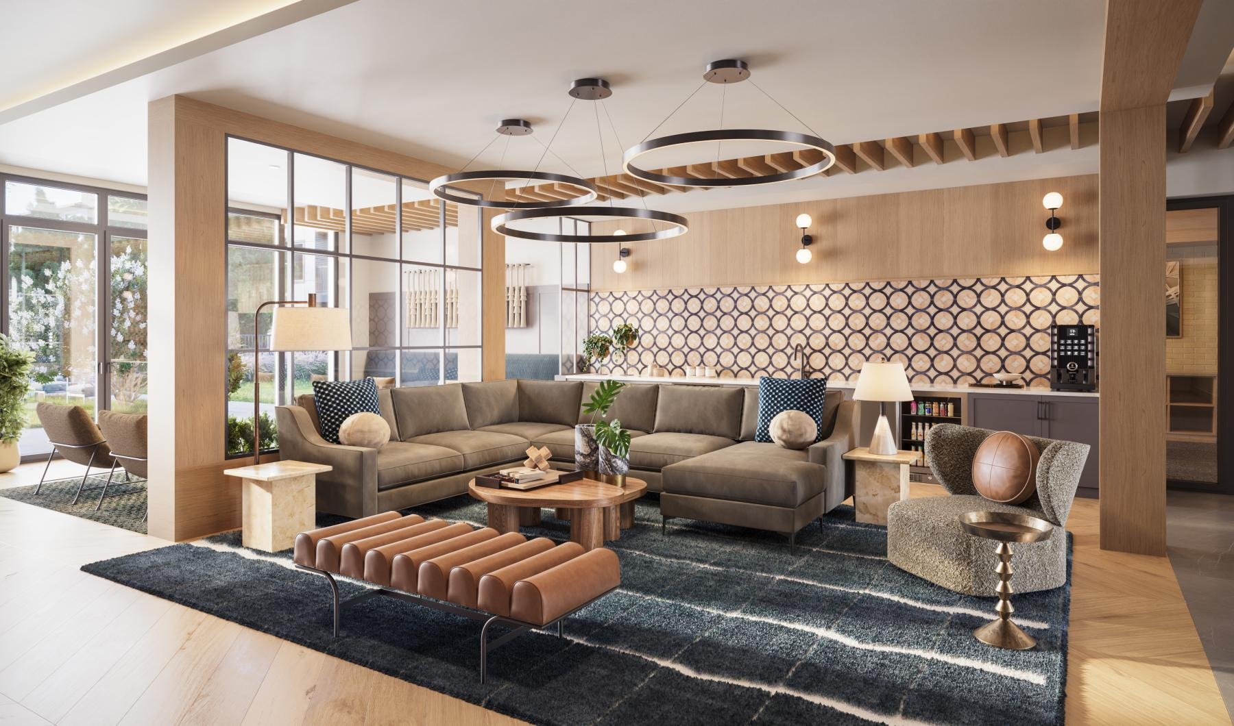a clubroom with a couch, tables and chairs