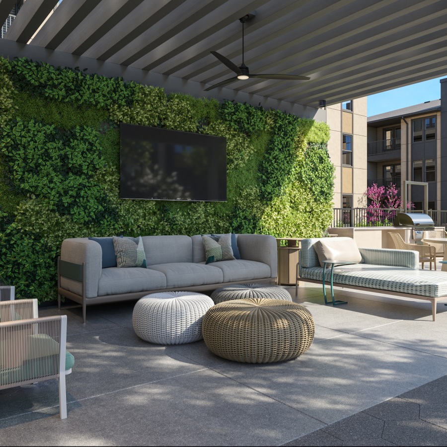 a patio with chairs and tables and a building in the background