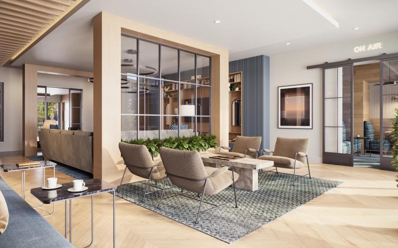 a clubroom with tables and chairs